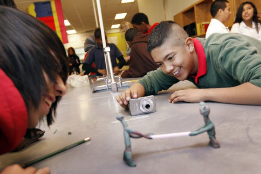 Eighth-graders Jose Obando and Iran Aguirre participate in stop-motion claymation video...