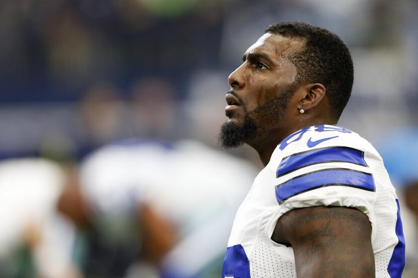 Dallas Cowboys wide receiver Dez Bryant (88) stretches during warmups before a game against...