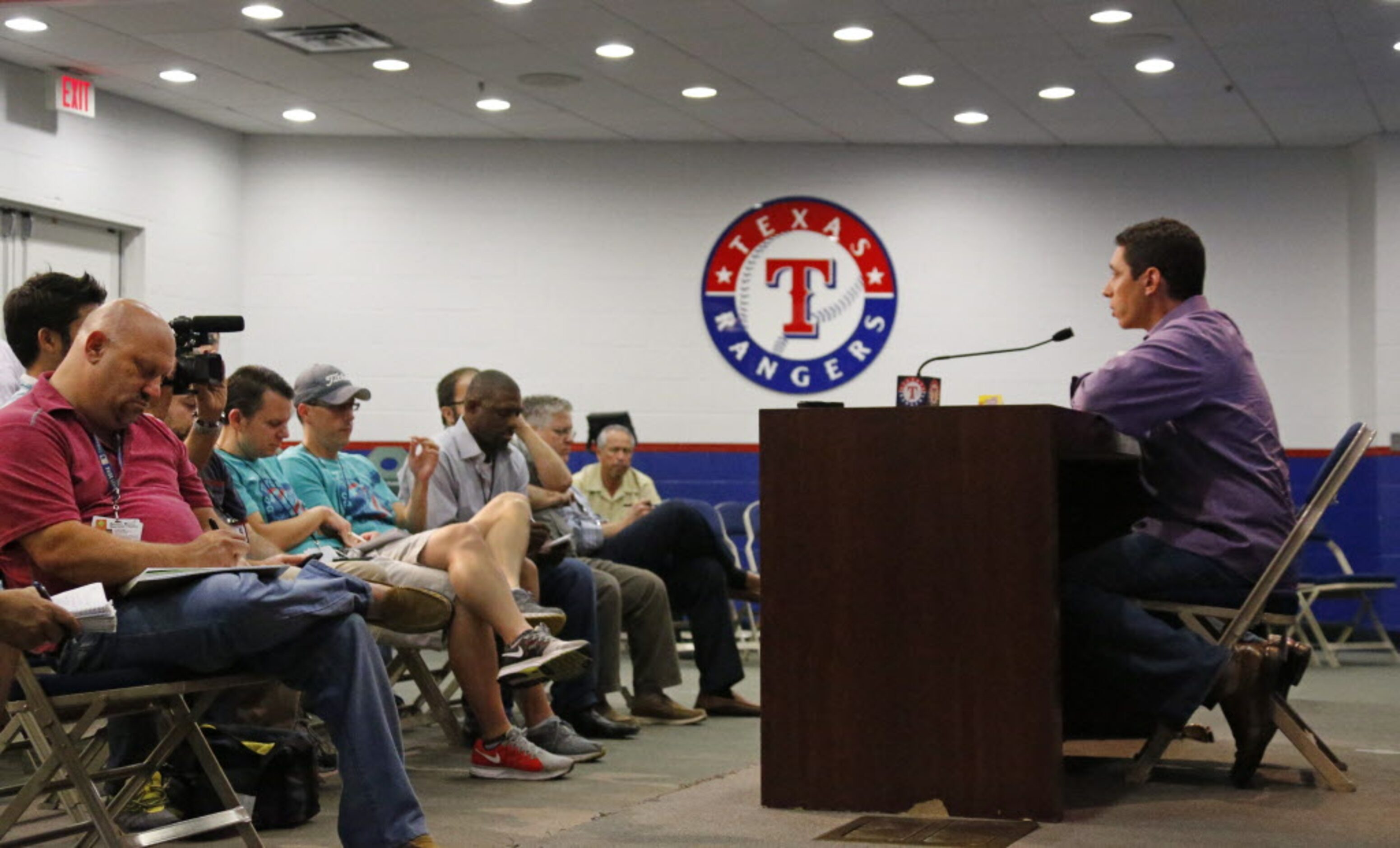 Texas general manager Jon Daniels talks with the media after the Rangers' 4-0 loss during...