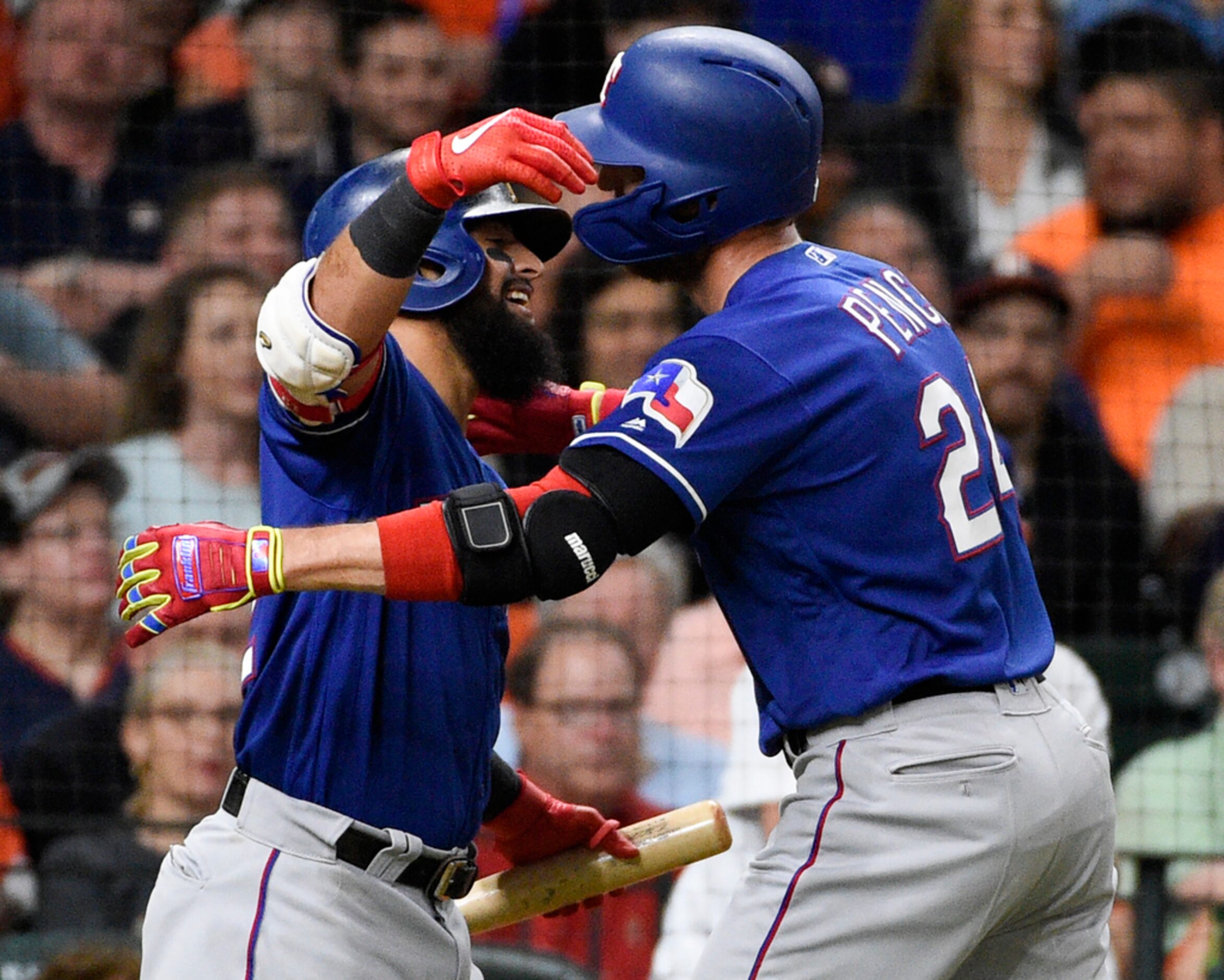 Texas Rangers' Hunter Pence, right, celebrates his solo home run off Houston Astros starting...