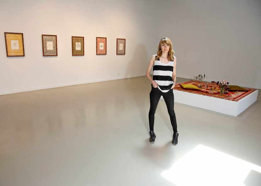 Artist Erin Stafford with her latest works, at Kirk Hopper Fine Art in Dallas.