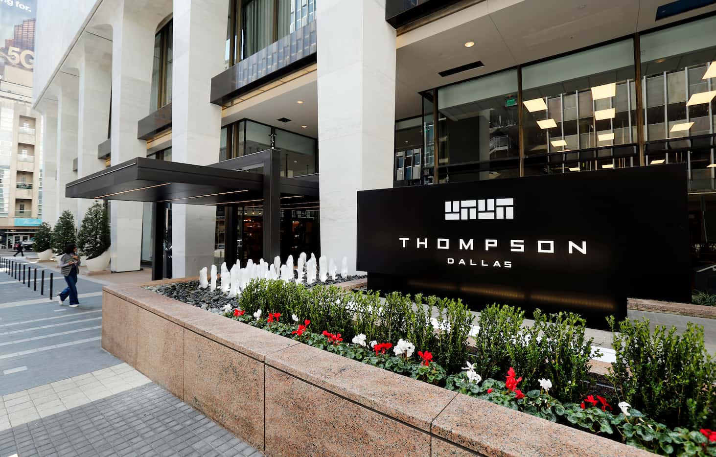 An exterior view of the entry to the 219-room Thompson Dallas luxury hotel that is part of a...