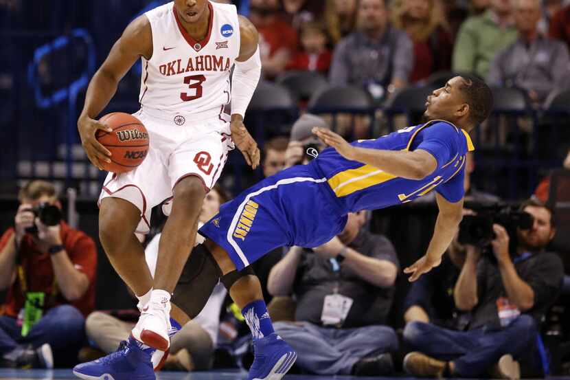 Oklahoma Sooners guard Christian James (3) is called or an offensive foul as Cal State...