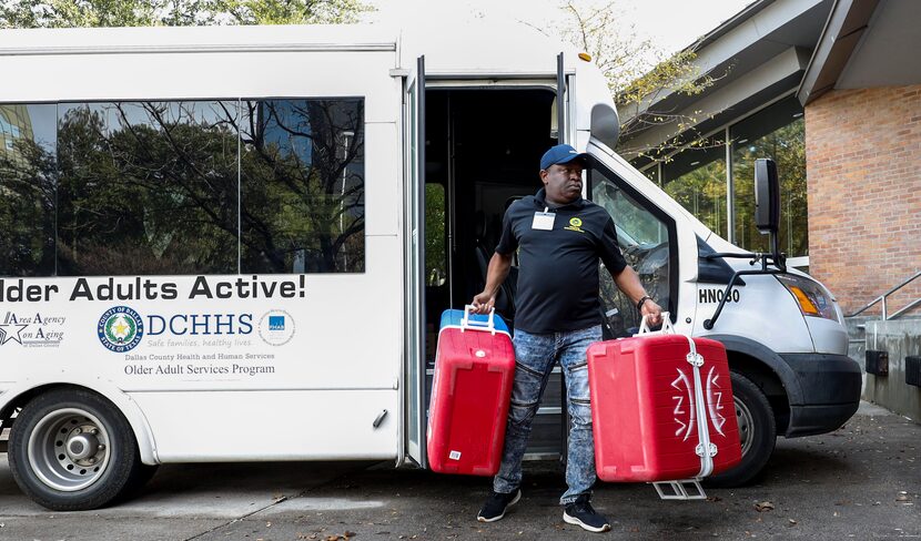 Glenn Willis from Dallas County Health and Human Services drops off empty hot and cold...