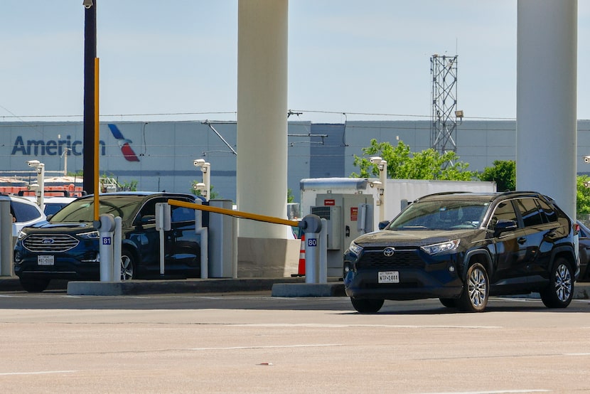 Drivers exit DFW International Airport through the north exit toll plaza, Friday, April 5,...