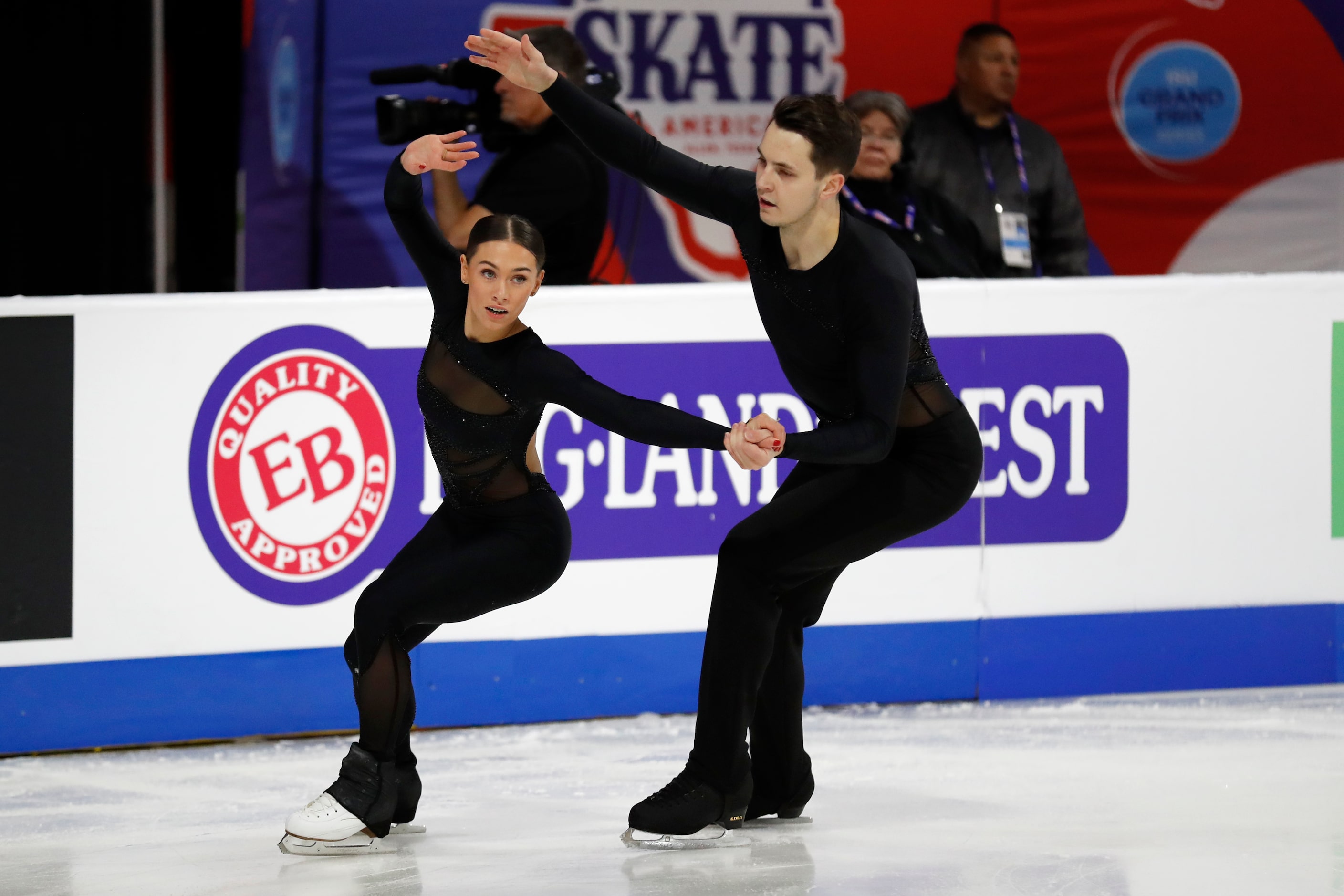 Anastasia Vaipan-Law, left, and Luke Digby, right, of Britain, compete in the pairs free...