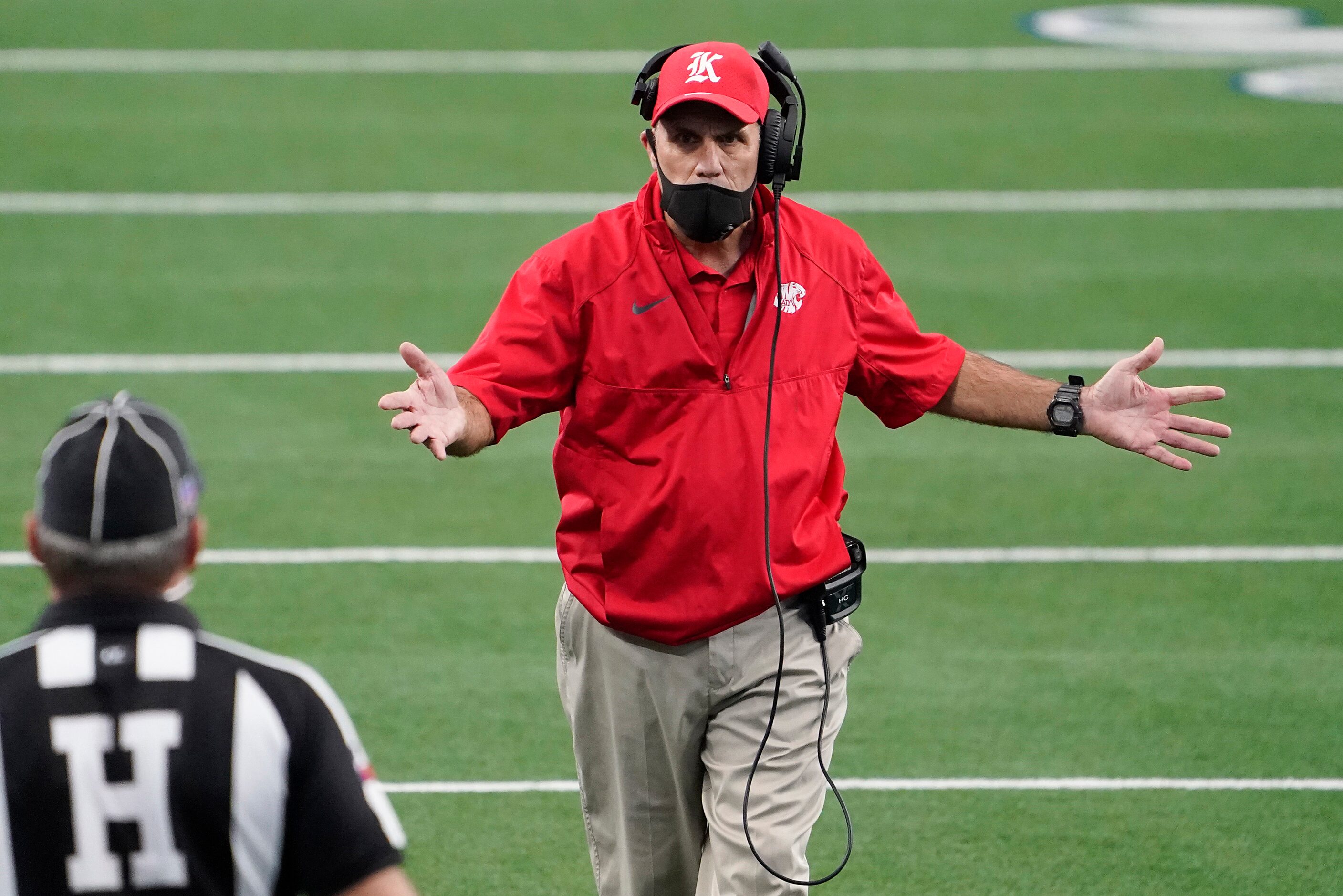 Katy head coach Gary Joseph argues a call during the first half of the Class 6A Division II...