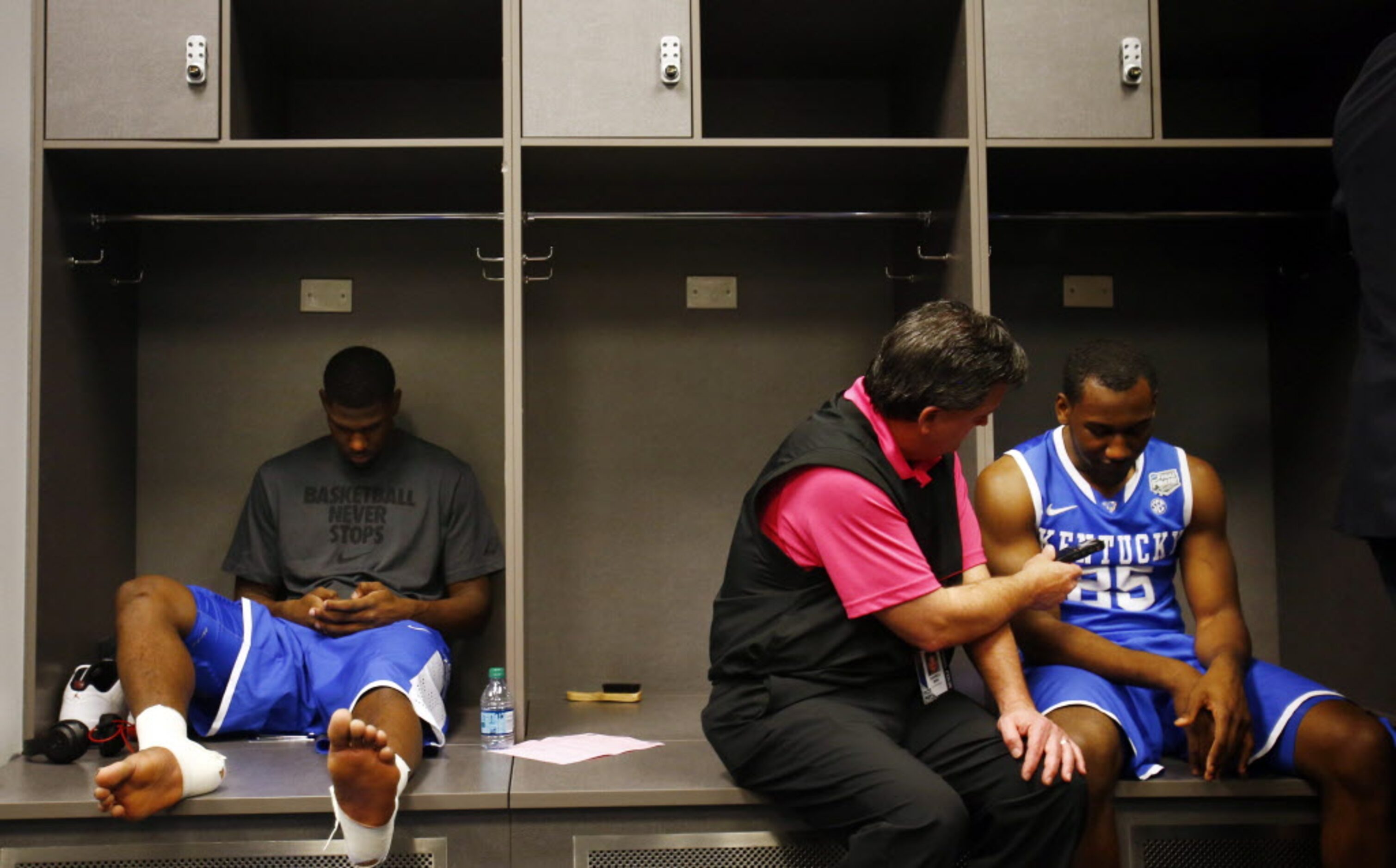 Kentucky Wildcats guard Dominique Hawkins (25) is interviewed in the locker room following a...