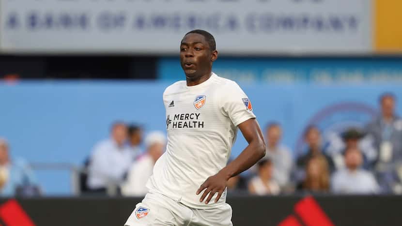 FC Cincinnati forward Fanendo Adi moves the ball up the pitch during the first half of an...
