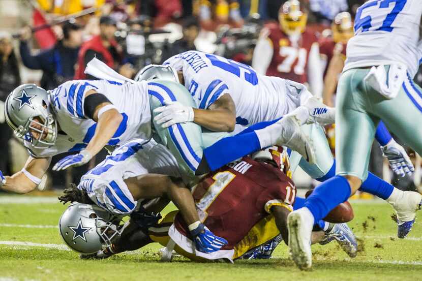 Washington Redskins wide receiver DeSean Jackson (11) turns the ball over with a fumble on a...