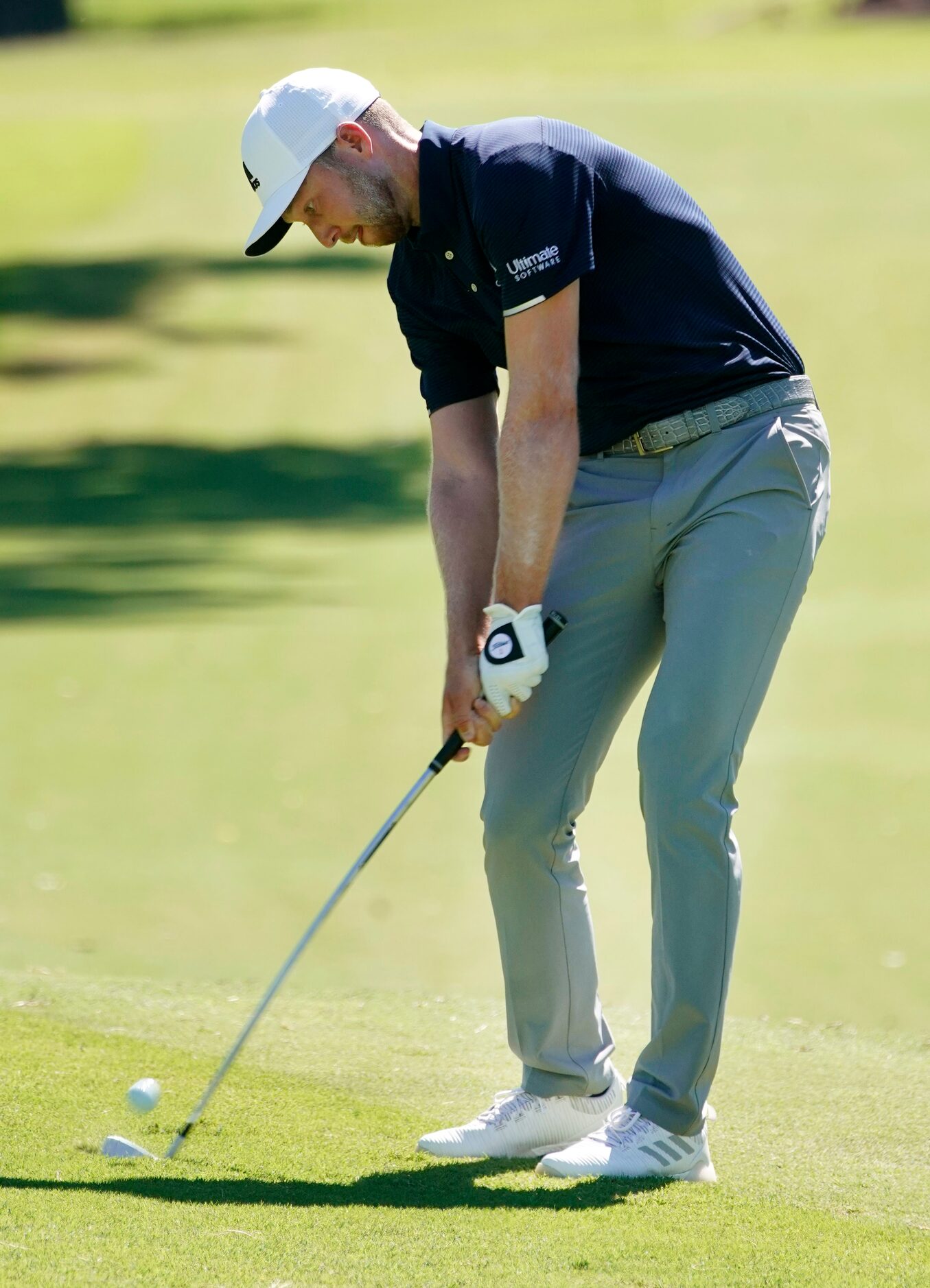 PGA Tour golfer Daniel Berger makes his approach shot on No. 18 during the final round of...