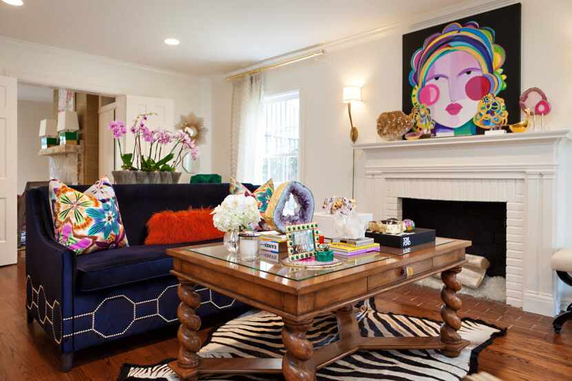 While she loves color, Lauren Renfrow says opting for white walls lets the wow-worthy pieces...