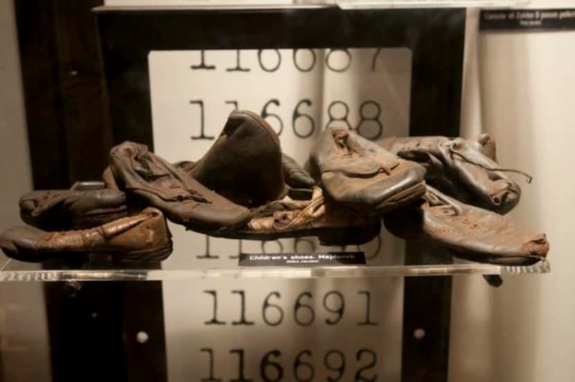 
Children’s shoes from a concentration camp are on display at the Dallas Holocaust...