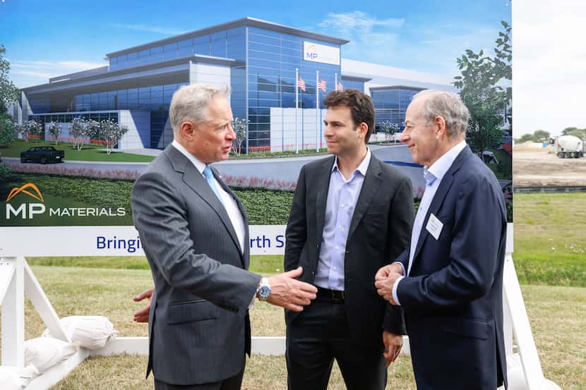 Ross Perot Jr. (left) speaks with MP Materials executives James (center) and Steven Litinsky...