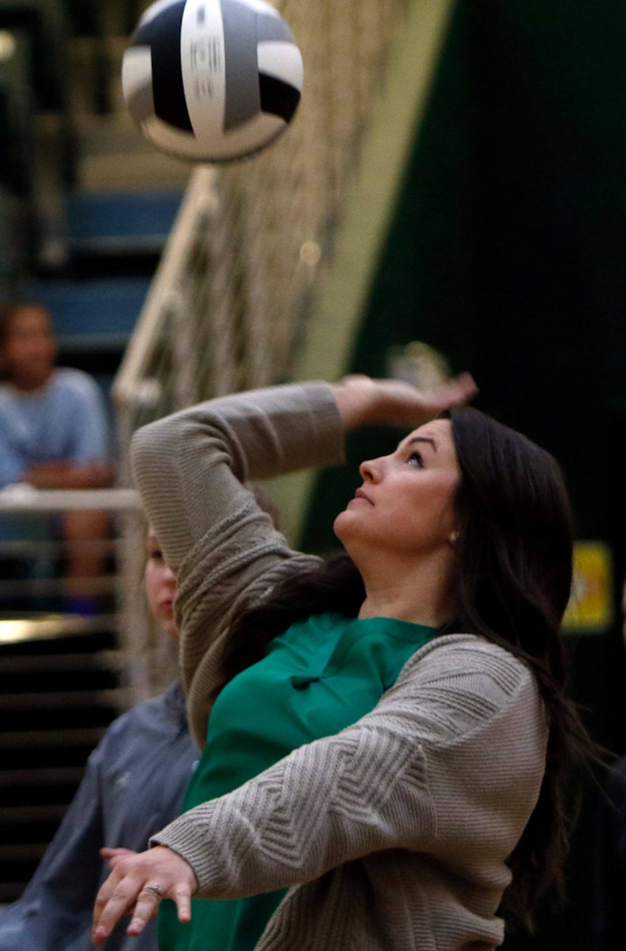 Prosper head coach Erin Kauffman puts her team through some warm-up drills prior to the...