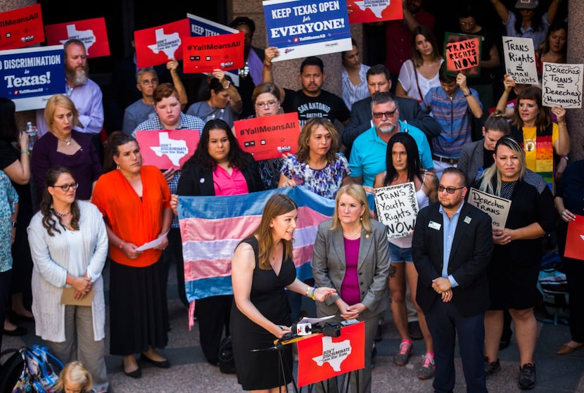 Ashley Smith (at microphone), who is transgender, speaks to protesters against the bathroom...