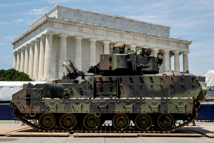 One of two Bradley Fighting Vehicles waited on July 3 to be driven in front of the Lincoln...