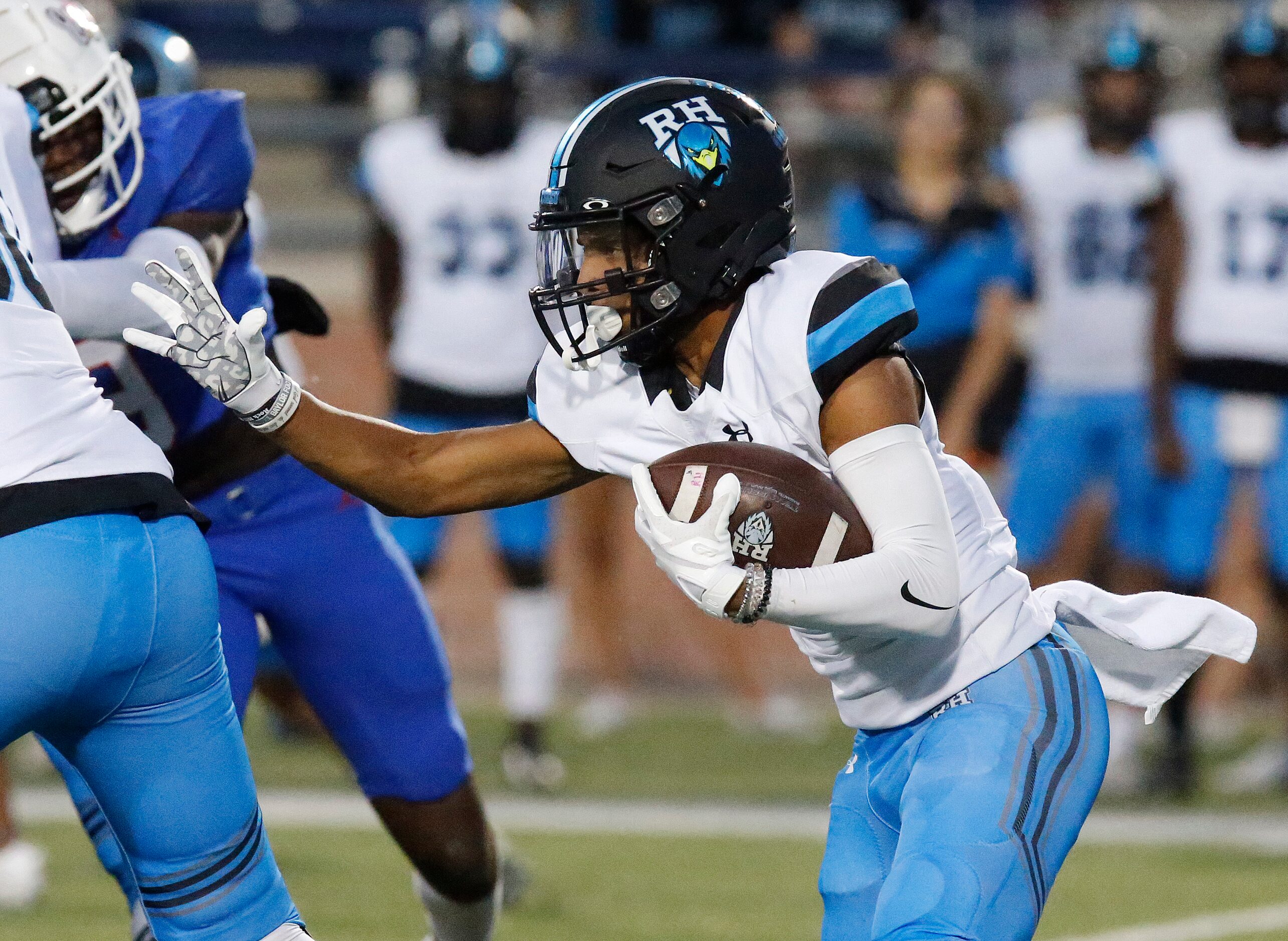 Rock Hill High School running back Victor Chionuma (2) runs the football during the first...