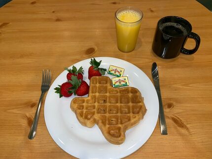 Dig into a waffle shaped like the state of Texas at the Crockett in San Antonio. 