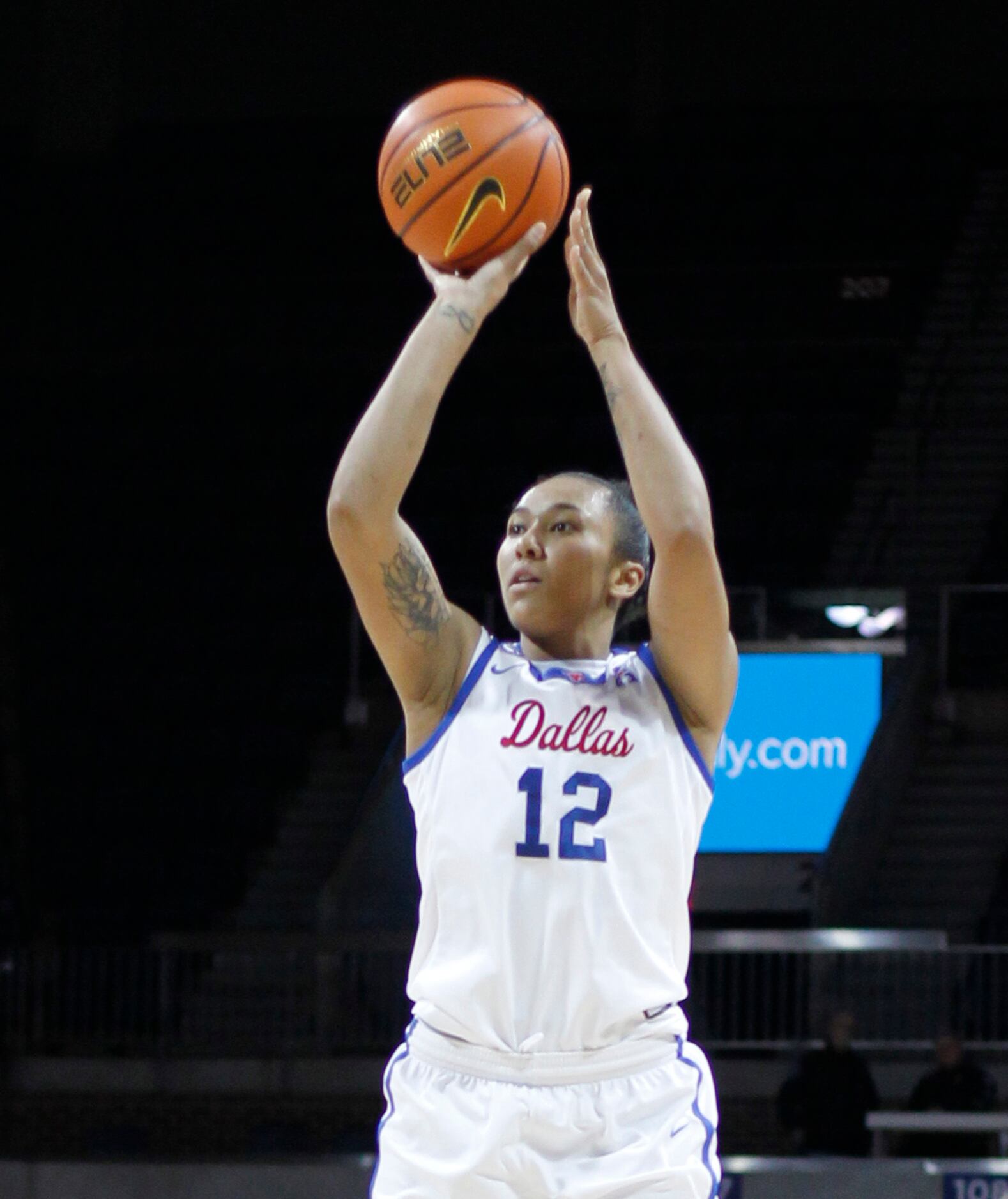 SMU forward Savannah Wilkinson (12) gets off an uncontested jump shot during first half...