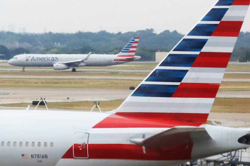 A look at American Airlines aircraft at DFW Airport, photographed on Friday, July 20, 2018....