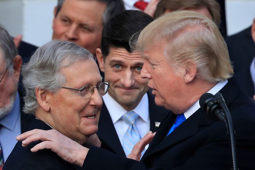 President Donald Trump congratulated Senate Majority Leader Mitch McConnell, R-Ky., while...