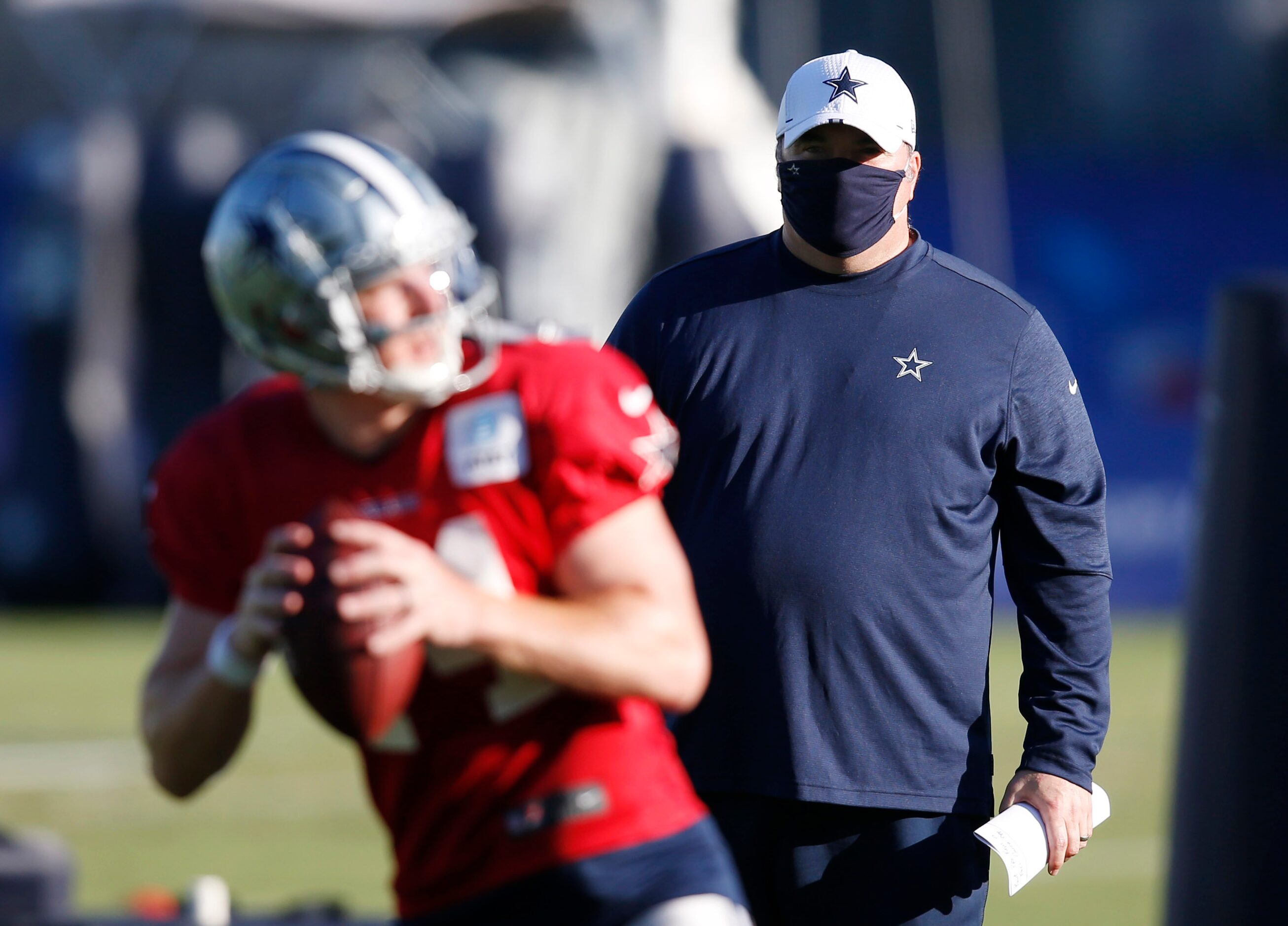 Dallas Cowboys head coach Mike McCarthy watches as Dallas Cowboys quarterback Andy Dalton...