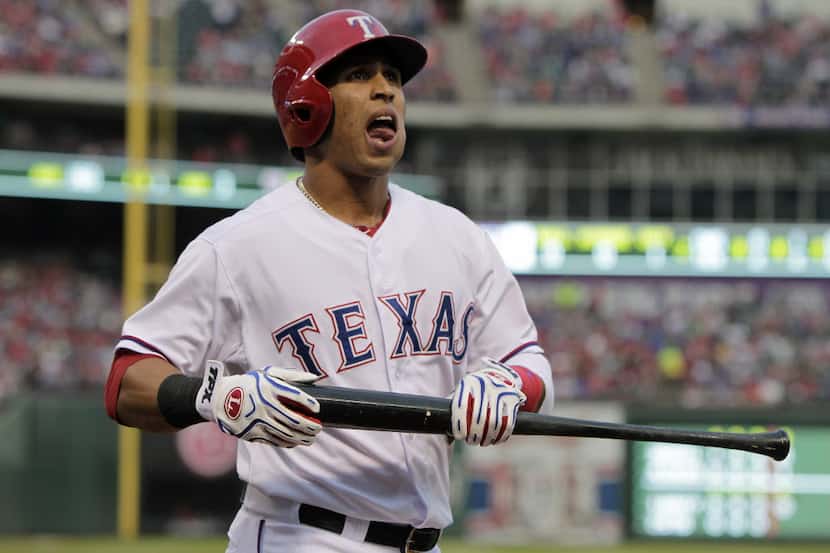 Texas Rangers center fielder Leonys Martin (2) walks back to the dugout in the 2nd inning of...