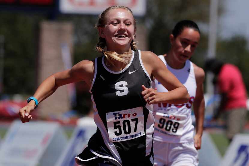 Cami Krzemiski of All Saints Episcopal wins the TAPPS Women 100 Meters Dash 5A with a time...