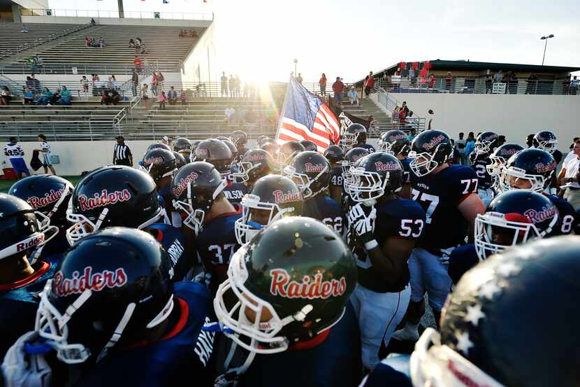 The Ryan Raiders stretch before they take the field against Hebron, Thursday, September 3,...