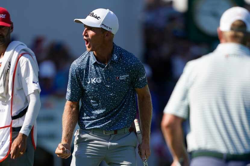 Will Zalatoris celebrates after making a putt on the 18th green during the final round of...