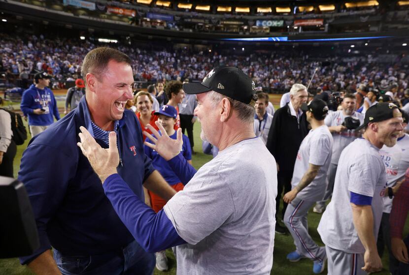 Texas Rangers general manager Chris Young (left) and manager Bruce Bochy who led the team to...