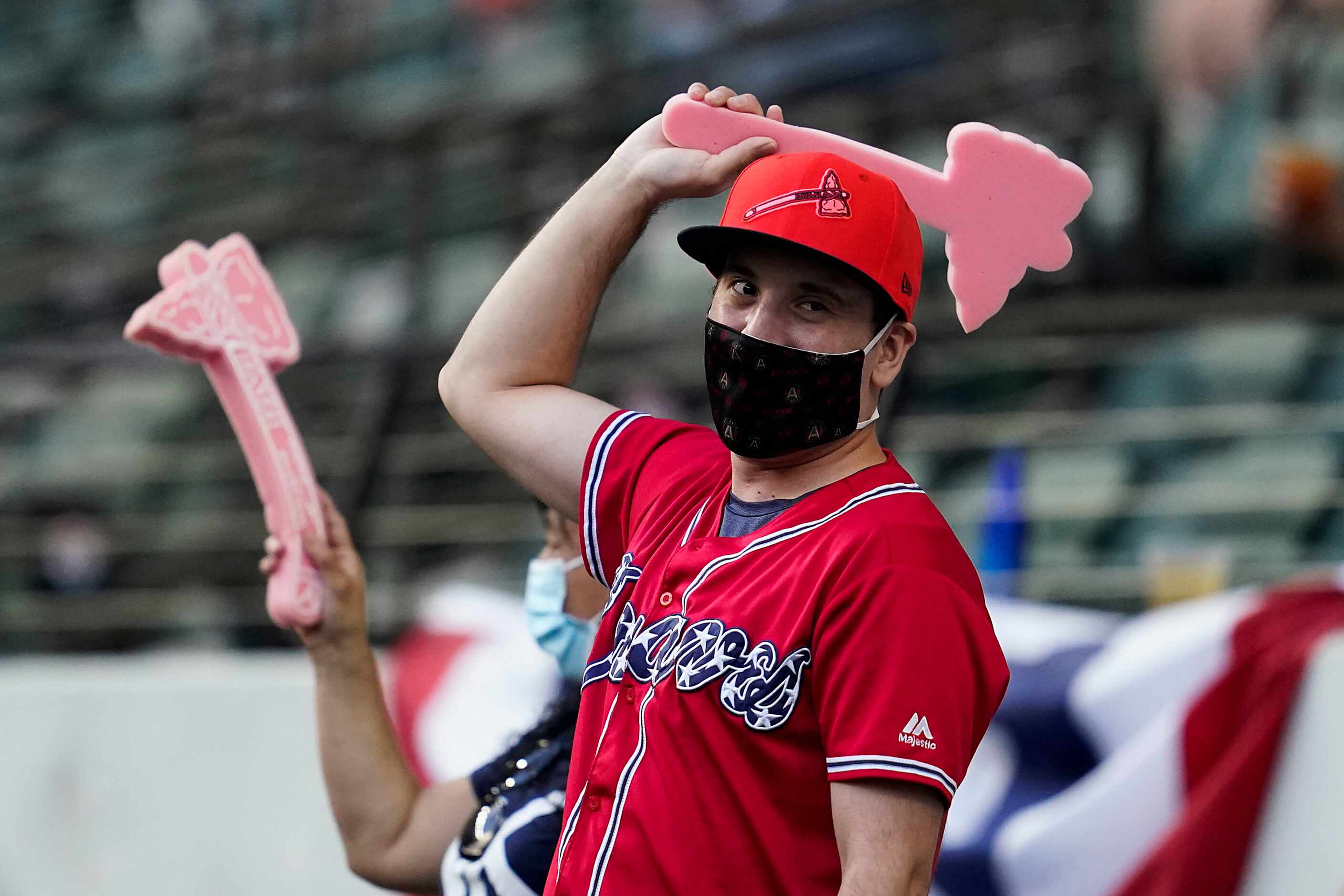 Atlanta Braves fans do the tomahawk chop chant after a 2-run home run by first baseman...