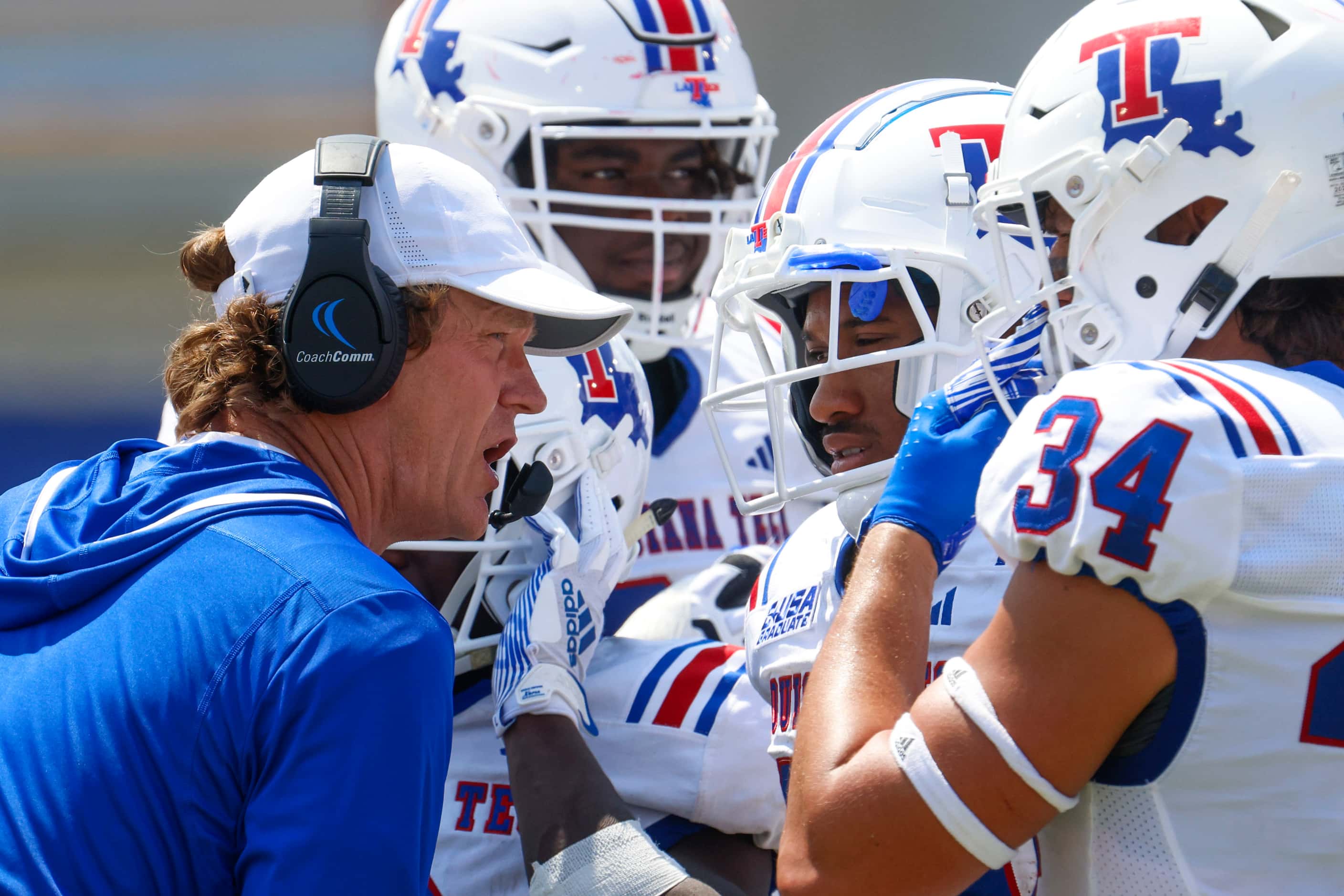 Louisiana Tech head coach Sonny Cumbie talks to the team during the second half of a...