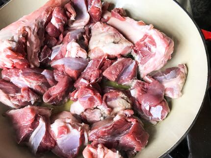 Quickly brown lamb shanks, after cutting the meat off the bones into chunks.
