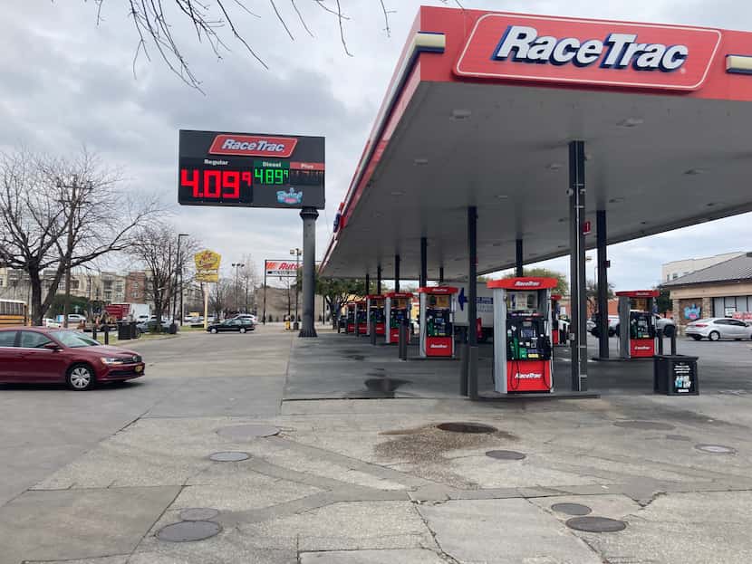 Gas prices are displayed at a RaceTrac gas station at the intersection of Maple Avenue and...