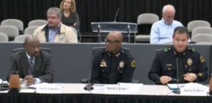  Dallas Police Chief David Brown (center) said he defers to the officer's decision not to...