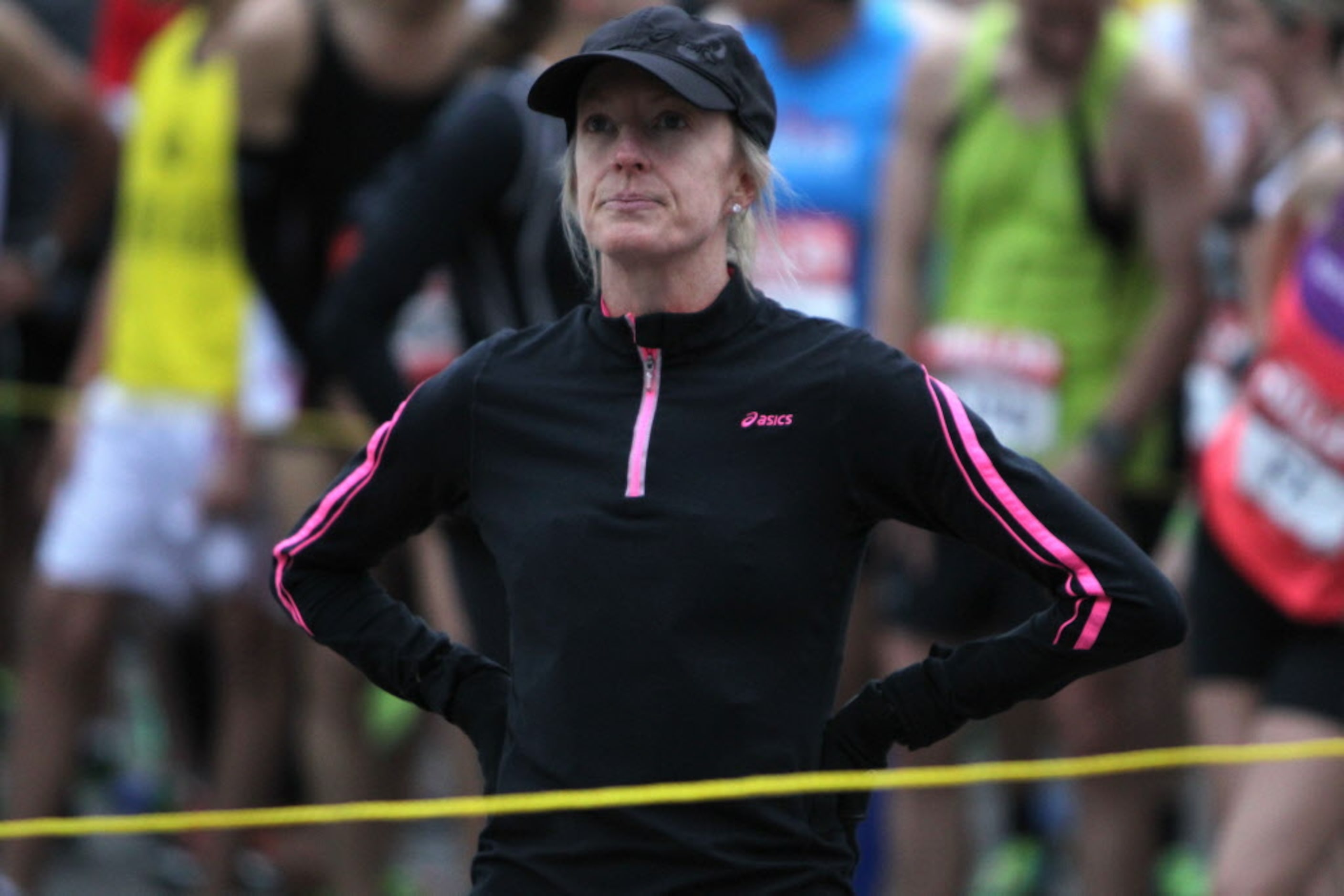 Olympic medal holder Deena Kastor eyes the starting line before the start of the Dallas Rock...