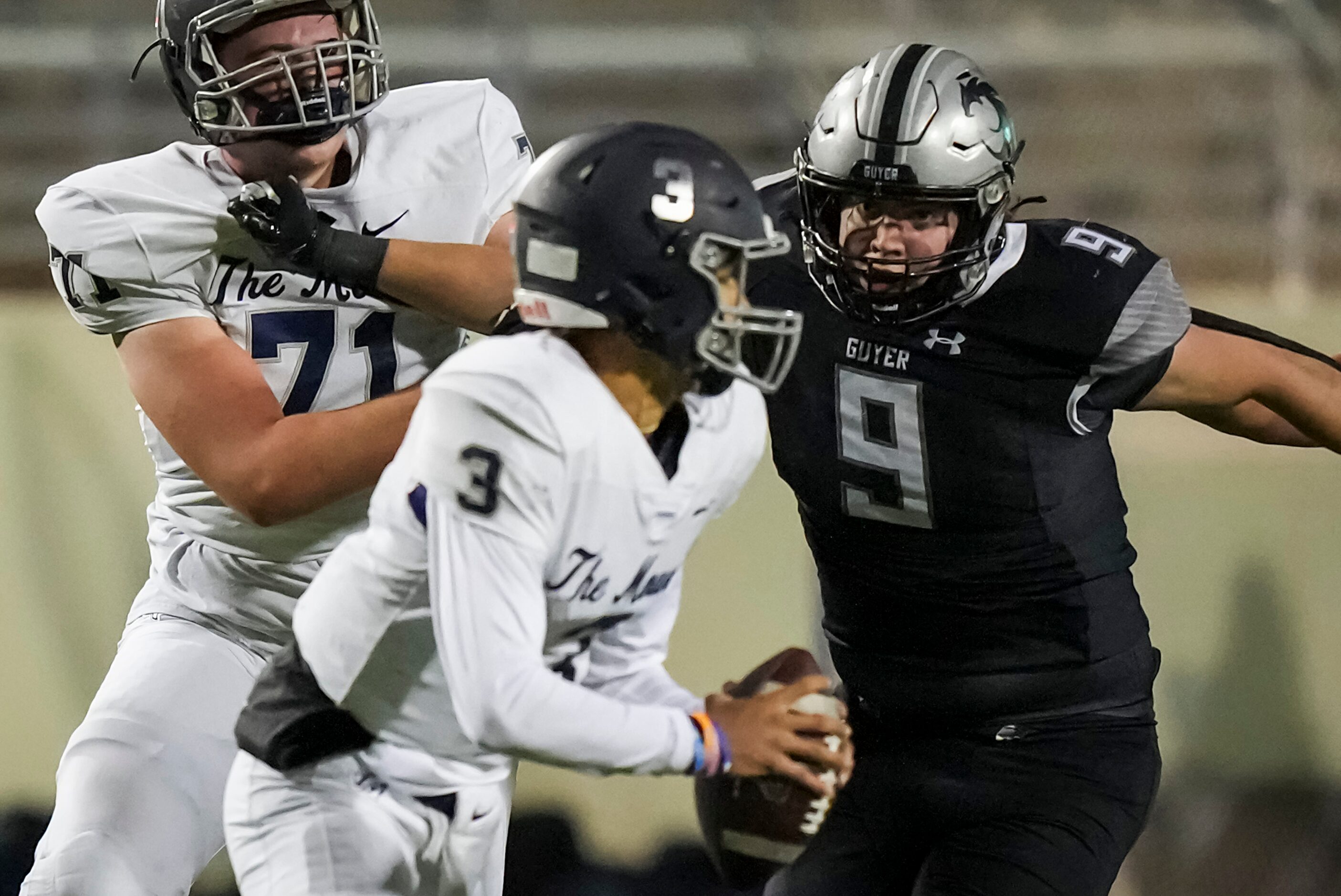 Flower Mound quarterback Nick Evers (3) scrambles away from Denton Guyer defensive lineman...