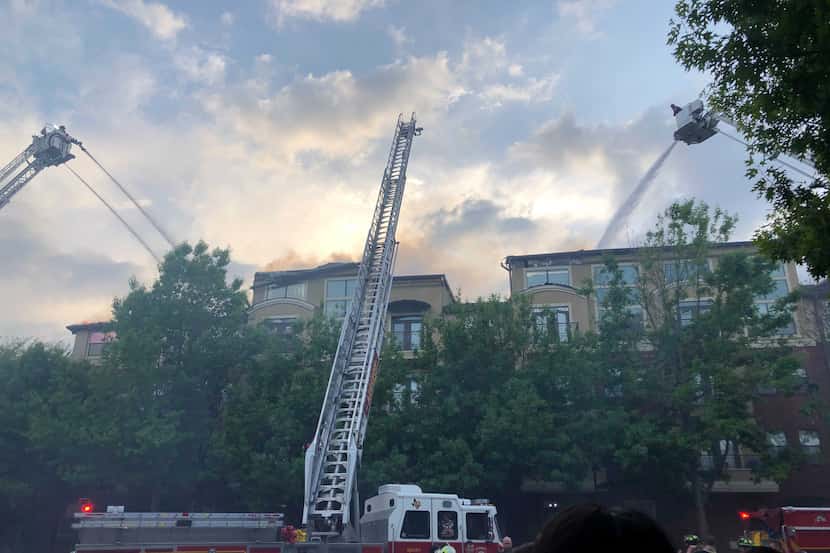 Firefighters worked to extinguish a blaze at the Cortland Addison Circle apartments Monday...