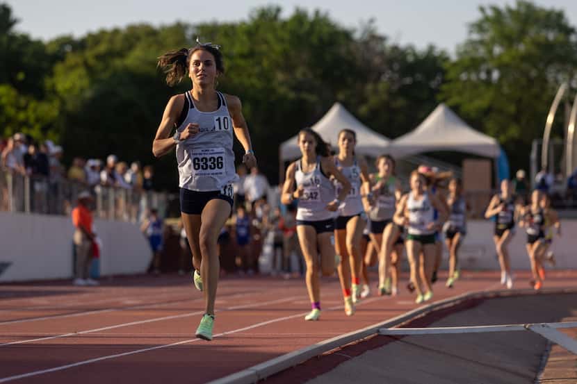 Flower Mound's Natalie Cook leads in the 6A girls 1600m race at the UIL Class 6A Region I...