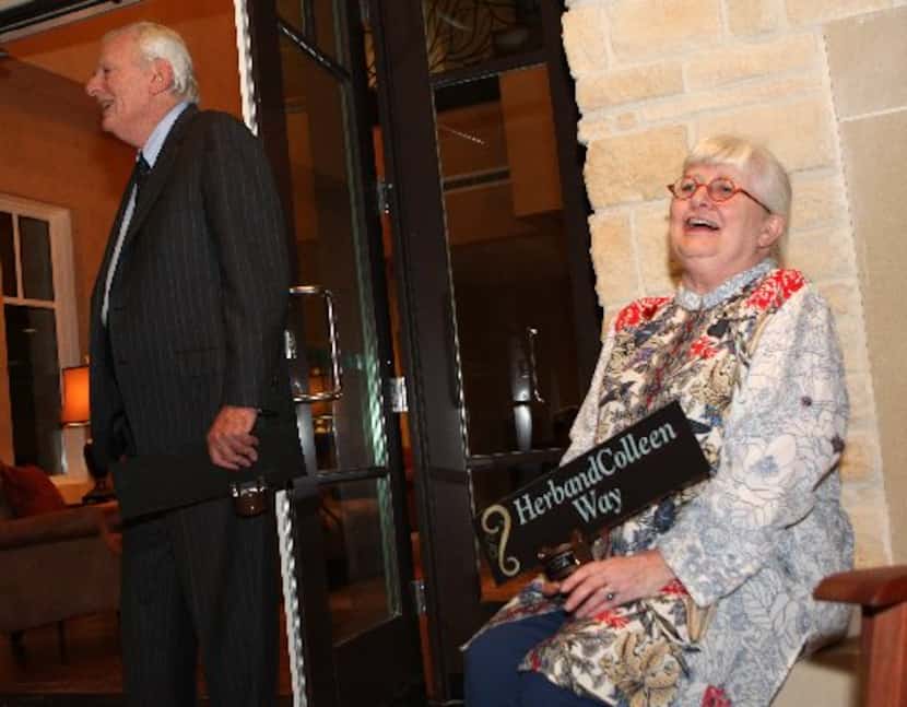 Herb Kelleher and Colleen Barrett laugh during a dedication ceremony naming a private drive...