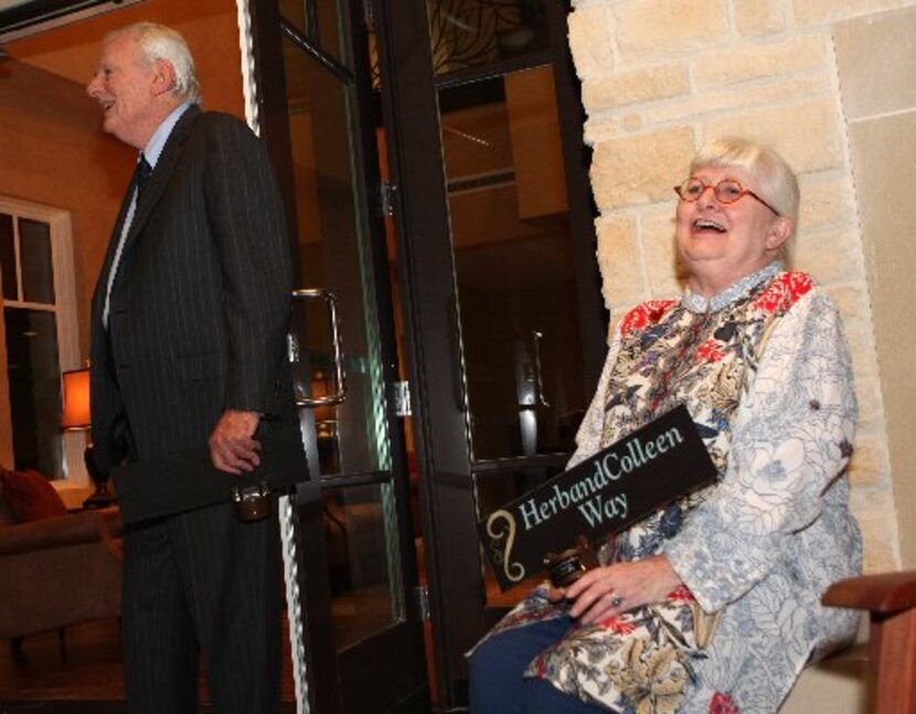 Herb Kelleher and Colleen Barrett laugh during a dedication ceremony naming a private drive...