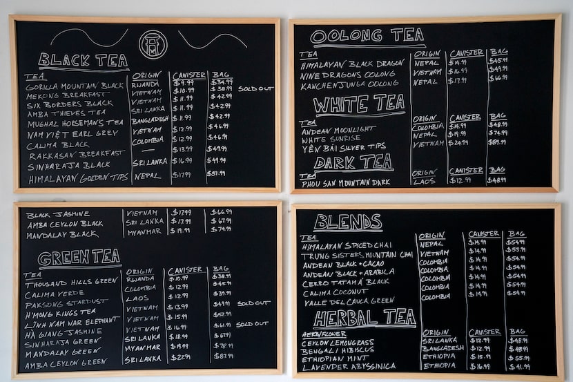 A blackboard menu hangs on the wall of Rakkasan Tea in Dallas.