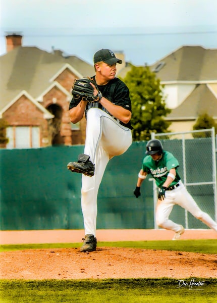 Family photo of Taylor Hooton pitching at Plano West.  