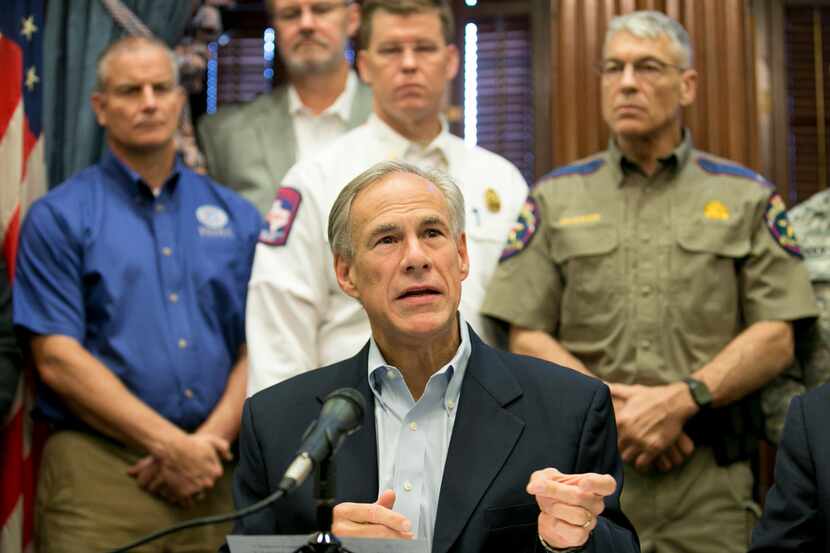 Gov. Greg Abbott talks about the effort to recover from Hurricane Harvey at a news...