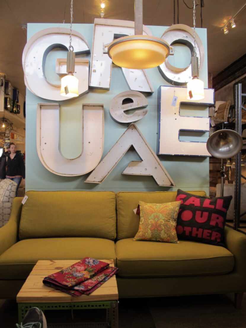 Vintage and mid-century modern home furnishings and accessories are sold at Red, a home...