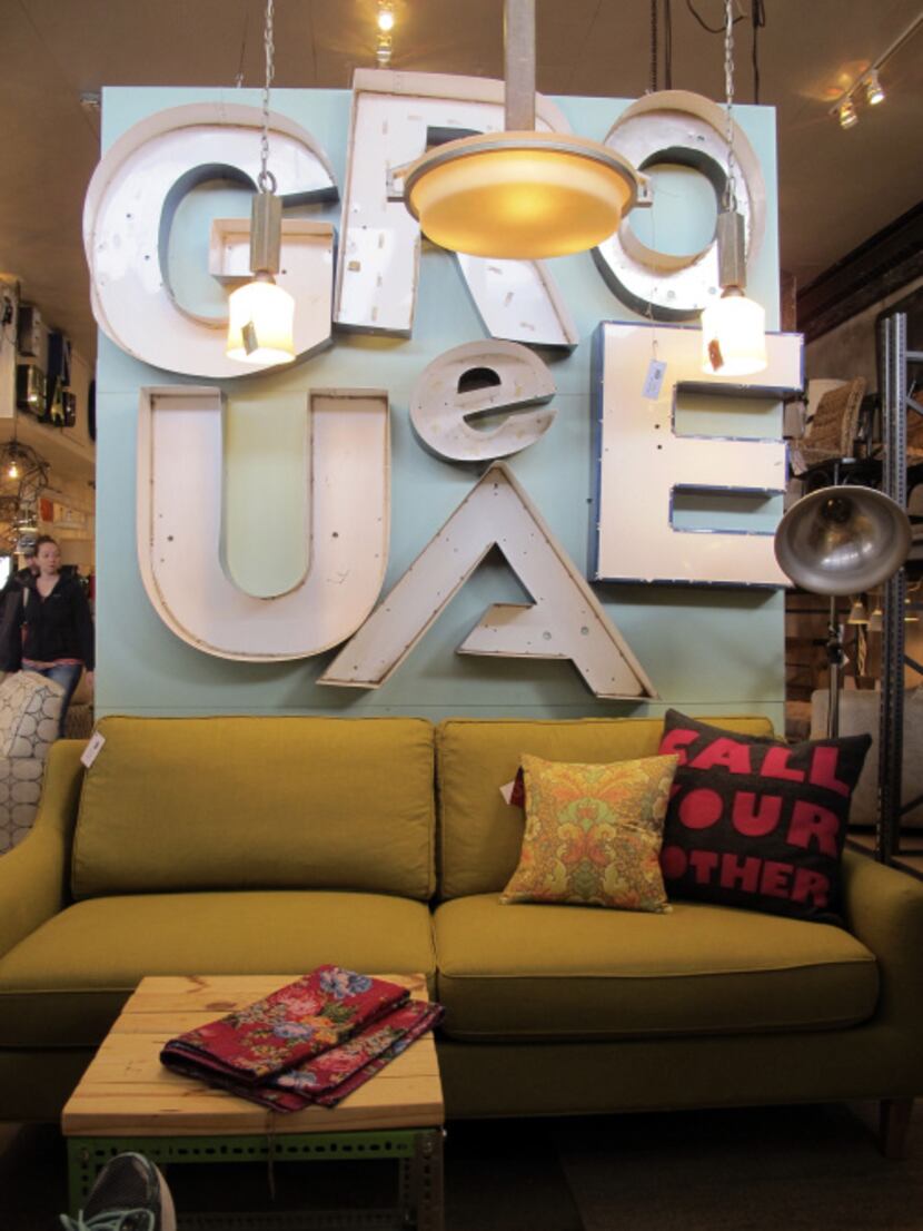 Vintage and mid-century modern home furnishings and accessories are sold at Red, a home...