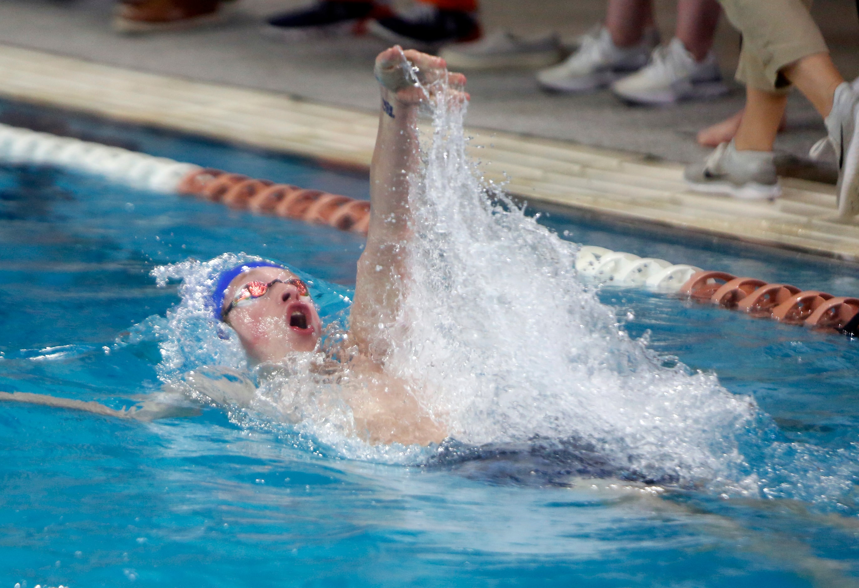 A member of the Midlothian relay team competes in the 5A Boys 200 Yard Relay event. The...