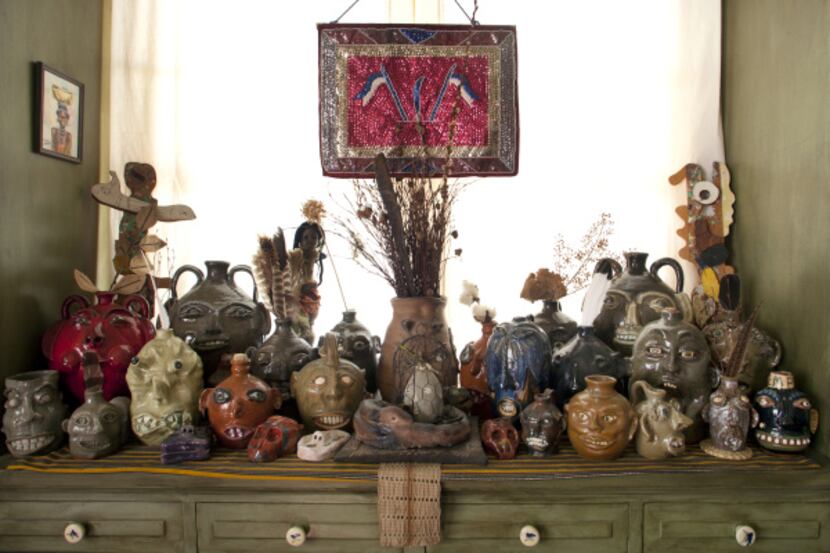 Face jugs collection in the dining room at the home of artist Jean Lacy photographed in...
